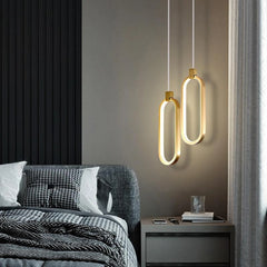 Lámpara colgante ovalada LED dorada minimalista para mesita de noche