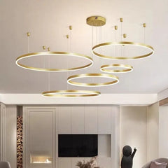 Lámpara colgante de círculos LED regulable de metal moderna para salón