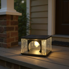 Sobremuro exterior solar de diseño en vidrio IP65 para jardín