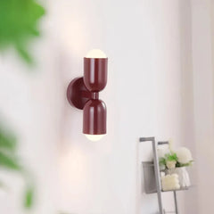 Aplique de pared bidireccional moderno en tono morandi para mesita de noche