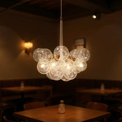 Lámpara de araña racimo moderna de vidrio regulable en altura para comedor