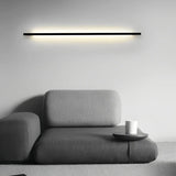 Aplique lineal de pared minimalista negro con LED de luz suave para salón