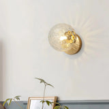 Aplique de pared esfera LED de vidrio con metal dorado para dormitorio