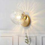 Aplique de pared esfera LED de vidrio con metal dorado para dormitorio