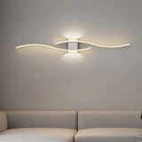Aplique de pared moderno LED de metal con diseño curvo para dormitorio