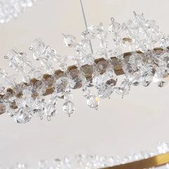 Lámpara colgante de cristal LED dorada con diseño de anillos elegante