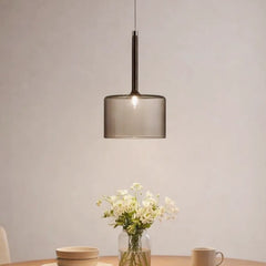 Lámpara colgante cilíndrica de vidrio moderna regulable en altura para comedor