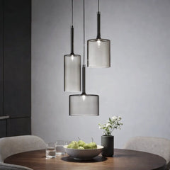 Lámpara colgante cilíndrica de vidrio moderna regulable en altura para comedor