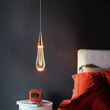 Lámpara colgante de gotas de cristal dorado LED para mesita de noche
