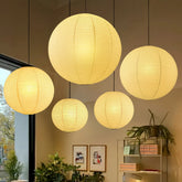 Lámpara colgante esférica de papel beige estilo Japandi, regulable en altura para el salón
