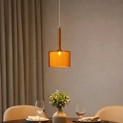 Lámpara colgante cilíndrica de vidrio moderna regulable en altura para comedor