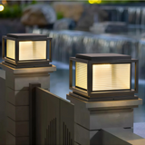 Baliza sobremuro exterior LED IP65 de vidrio y metal negra para jardín