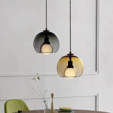 Lámpara de vidrio colgante LED moderna regulable en altura para comedor