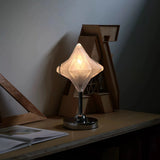 Lámpara de mesa decorativa moderna de vidrio estrella para dormitorio blanca