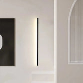 Aplique de pared lineal LED minimalista de metal para salón
