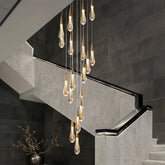 Lampara colgante para escalera de cristal lágrima dorado moderno