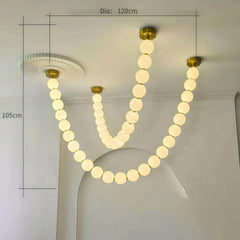 Lámpara colgante moderna y elegante con cadena de bolas blanca para salón