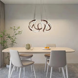 Lámpara colgante de diseño irregular LED regulable en altura para comedor