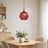 Lámpara colgante de vidrio de colores esférica moderna regulable en altura para comedor