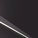 Aplique lineal de pared minimalista negro con LED de luz suave para salón