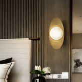 Aplique pared cobre LED moderno ovalado para dormitorio