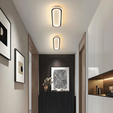 Lámpara de techo LED moderna y ovalada para pasillos con luz suave