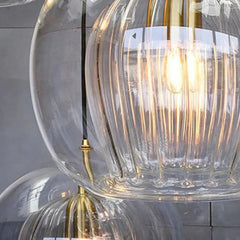 Lámpara colgante globo de vidrio de diseño regulable en altura para comedor