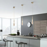 Lámpara colgante con gotas de cristal LED dorada moderna para comedor
