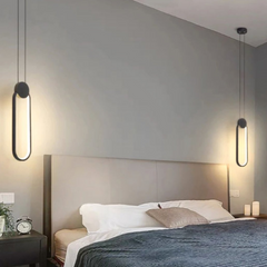 Lámpara colgante ovalada LED negra regulable de estilo moderno para dormitorio