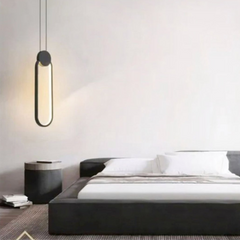 Lámpara colgante ovalada LED negra regulable de estilo moderno para dormitorio