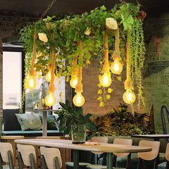 Lámpara colgante de restaurante con decoración de plantas retro
