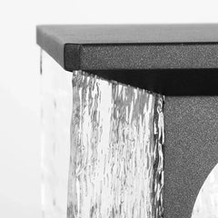 Sobremuro exterior solar de diseño en vidrio IP65 para jardín