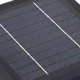 Sobremuro solar LED IP65 con diseño moderno rectangular negro para pilar