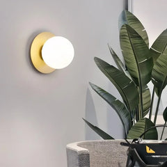 Apliques de pared modernos para salón diseño con vidrio esférico