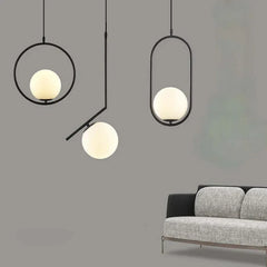 Apliques colgantes modernos con diseño esférico y minimalista