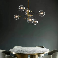 Lámpara colgante de vidrio moderna Magic Bean en dorado para comedor