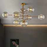 Lámpara colgante de vidrio moderna Magic Bean en dorado para comedor