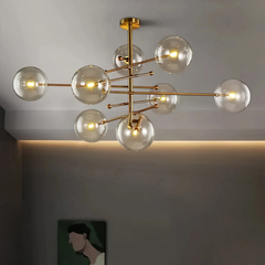 Lámpara colgante de vidrio moderna Magic Bean en dorado para comedor