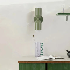 Aplique de pared bidireccional moderno en tono morandi para mesita de noche