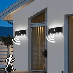 Aplique de pared exterior bidireccional con sensor de movimiento, 8 LEDs y IP65