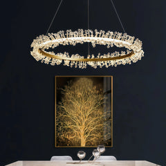 Lámpara colgante de cristal LED dorada con diseño de anillos elegante