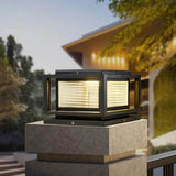 Baliza sobremuro exterior LED IP65 de vidrio y metal negra para jardín