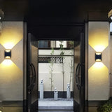 Aplique de pared exterior bidireccional LED de aluminio negro IP65 para porche