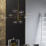 Lámpara colgante de vidrio moderna Magic Bean en dorado para comedor