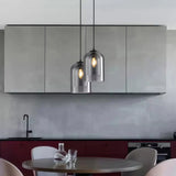 Lámpara colgante de cristal moderna regulable en altura con doble pantalla para comedor