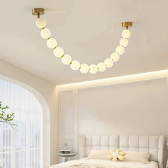 Lámpara colgante moderna y elegante con cadena de bolas blanca para salón