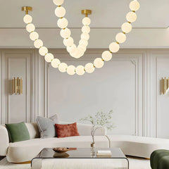 Lámpara colgante moderna y elegante con cadena de bolas blanca para salón