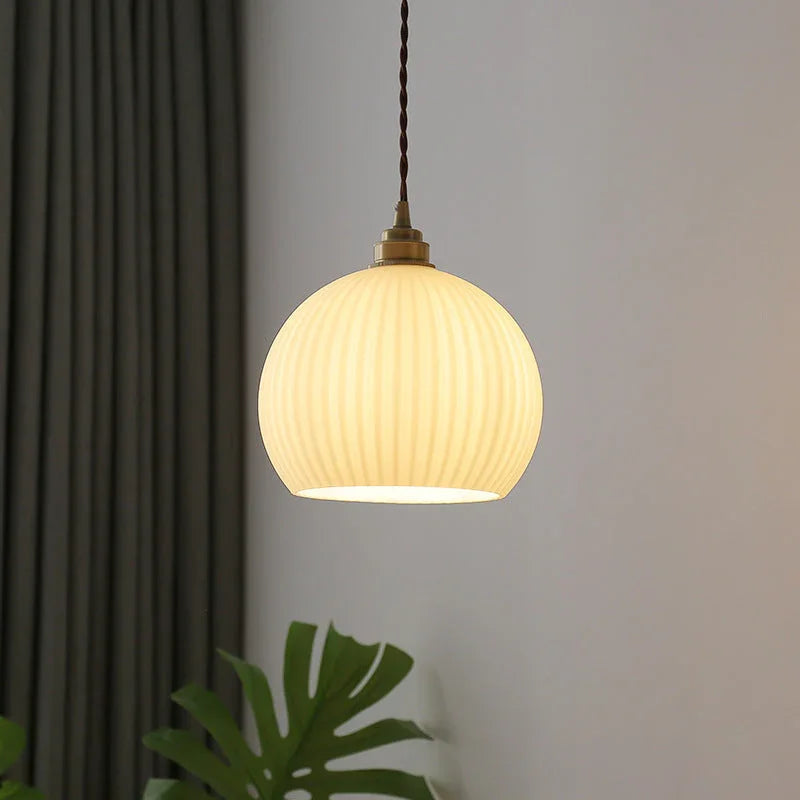 Luz colgante de vidrio esférico transparente a rayas