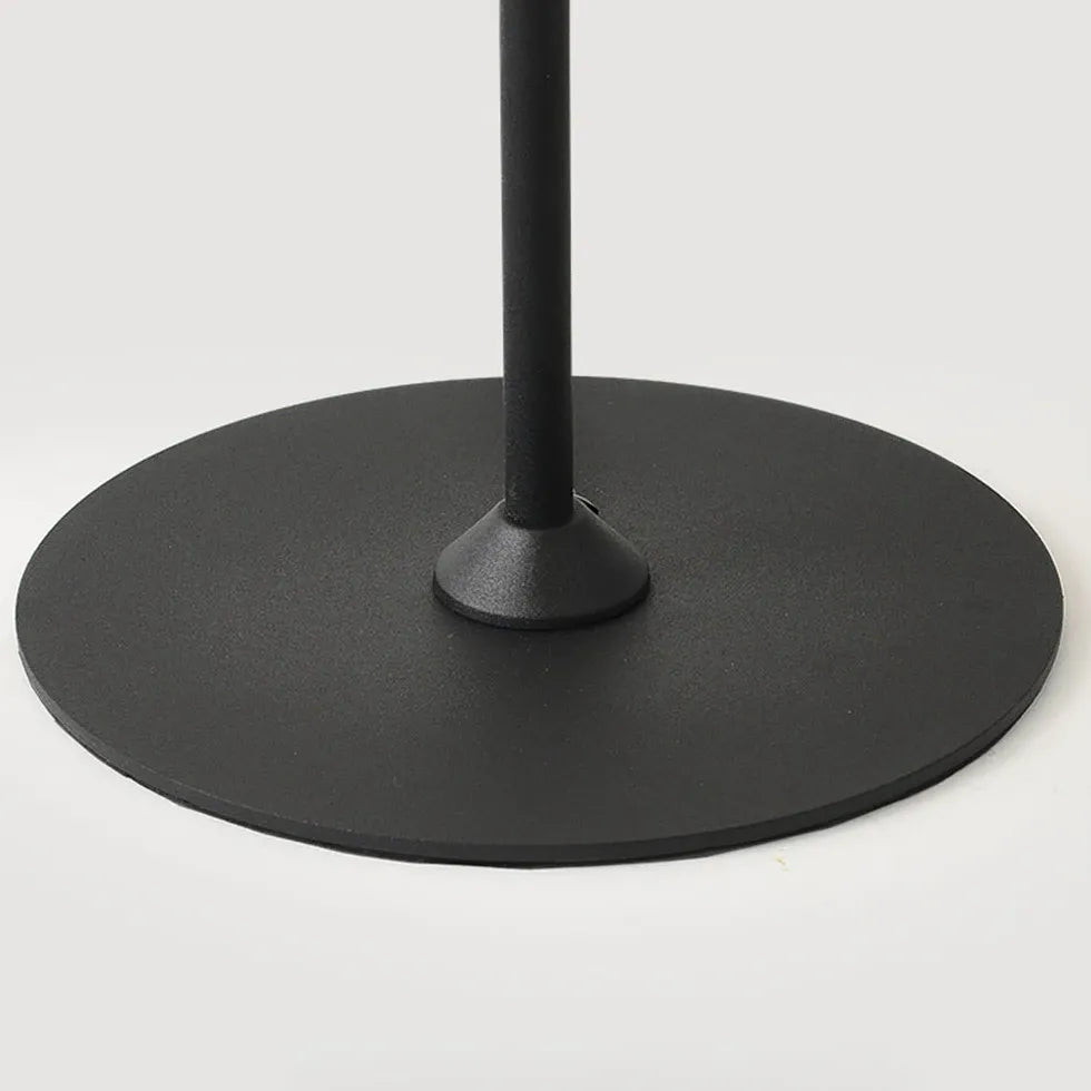 Lámpara de mesa moderna con forma de disco negro de gran tamaño 