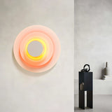 Aplique de pared redondo LED de diseño moderno multicolor para salón